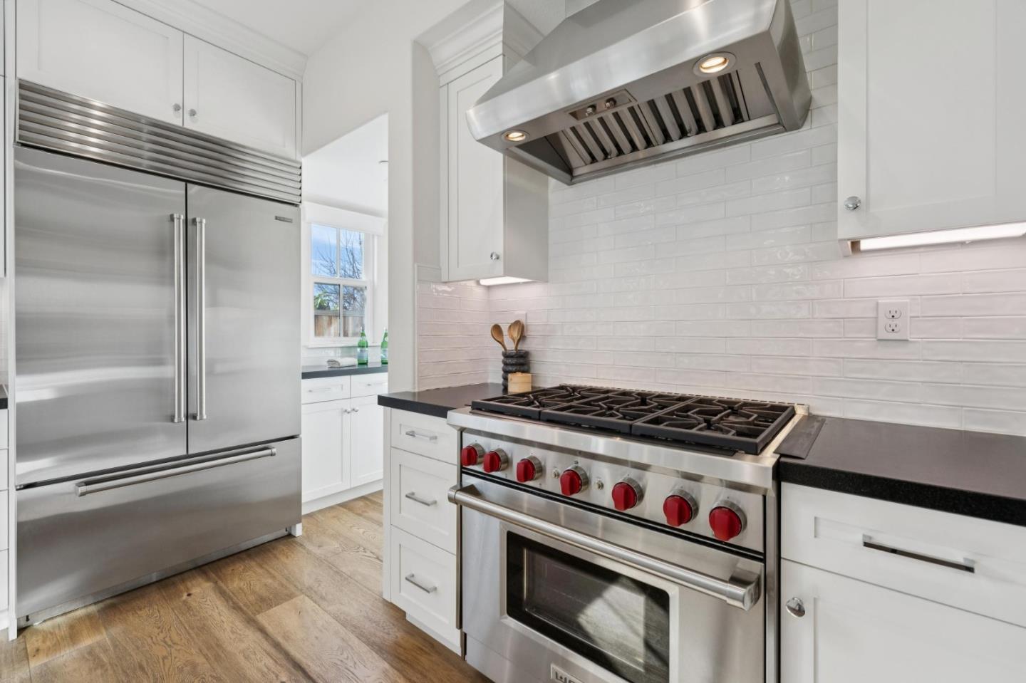1103 Creed Street Milpitas, CA 95035 - Photo 19 of 74 a kitchen with a stove and a refrigerator
