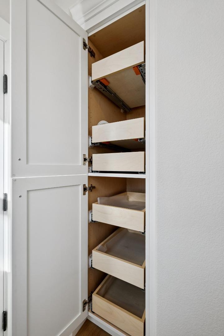 1103 Creed Street Milpitas, CA 95035 - Photo 22 of 74 a view of walk in closet with clothes and white walls
