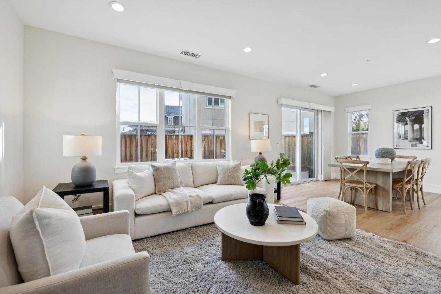 1103 Creed Street Milpitas, CA 95035 - Photo 25 of 74 a living room with furniture potted plant and a window