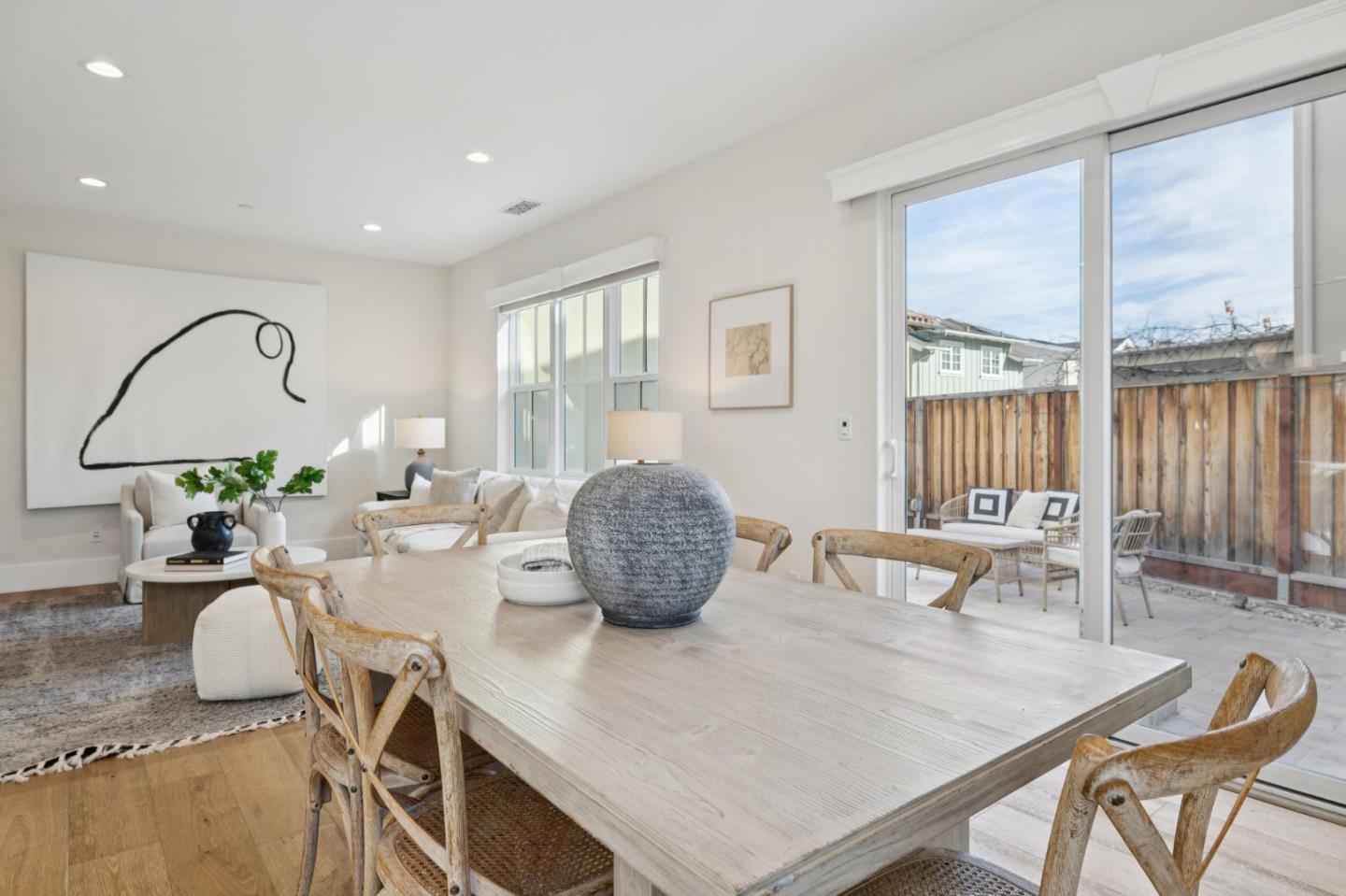 1103 Creed Street Milpitas, CA 95035 - Photo 28 of 74 a living room with dining table and a large window