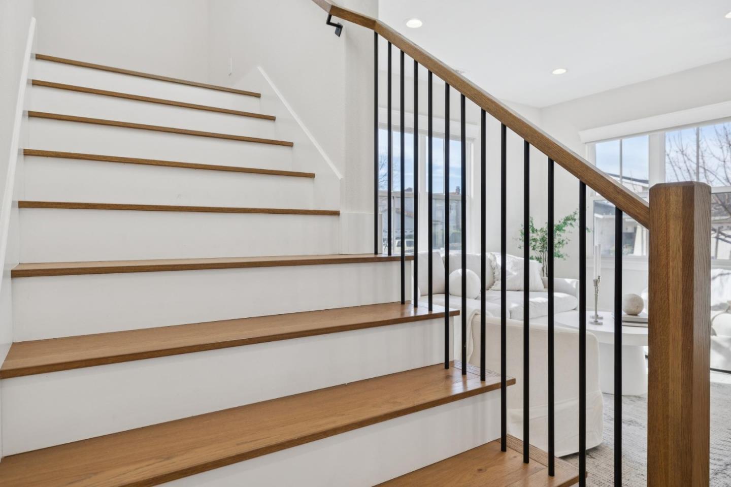 1103 Creed Street Milpitas, CA 95035 - Photo 31 of 74 a view of staircase with white walls and a window