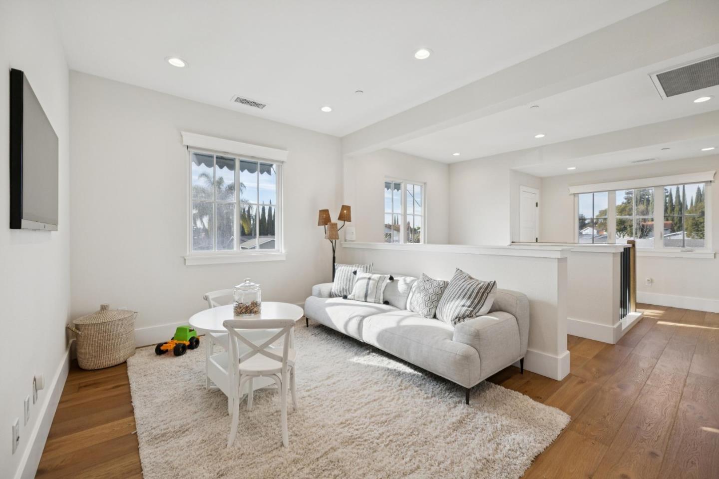 1103 Creed Street Milpitas, CA 95035 - Photo 33 of 74 a living room with furniture and wooden floor