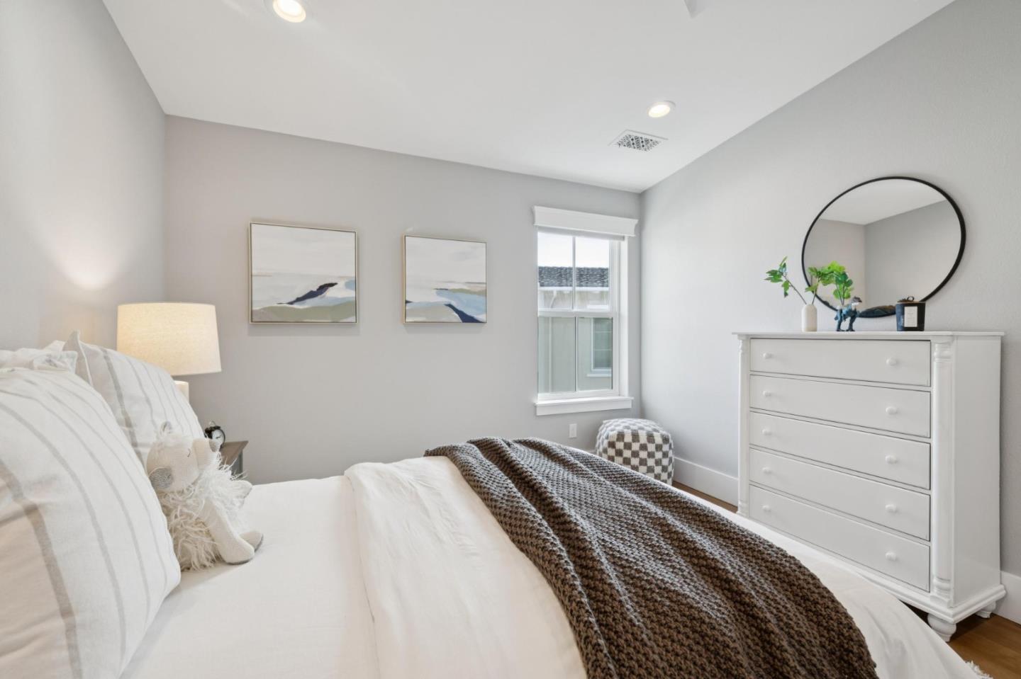 1103 Creed Street Milpitas, CA 95035 - Photo 49 of 74 a bedroom with a bed and a dresser