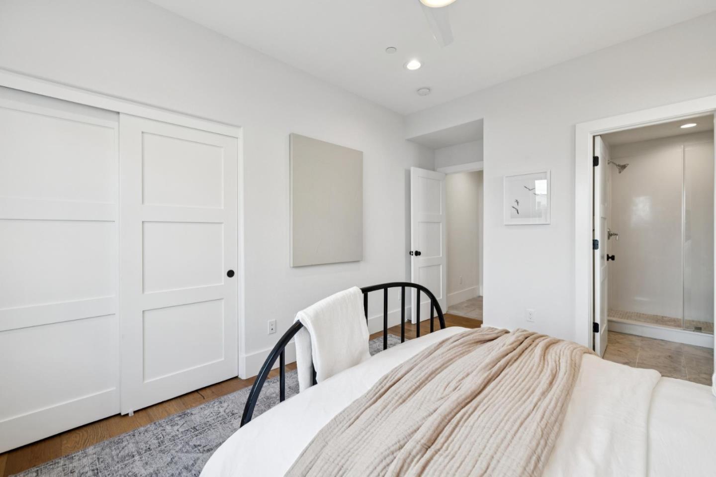 1103 Creed Street Milpitas, CA 95035 - Photo 57 of 74 a bedroom with a bed and wooden floor