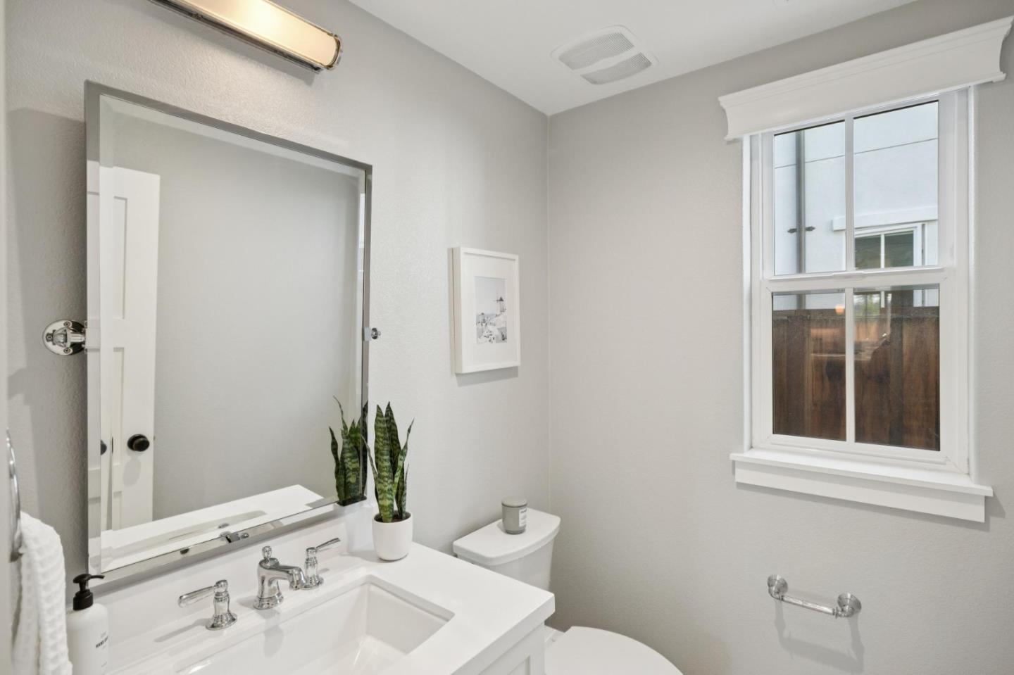 1103 Creed Street Milpitas, CA 95035 - Photo 62 of 74 a bathroom with a sink and a mirror