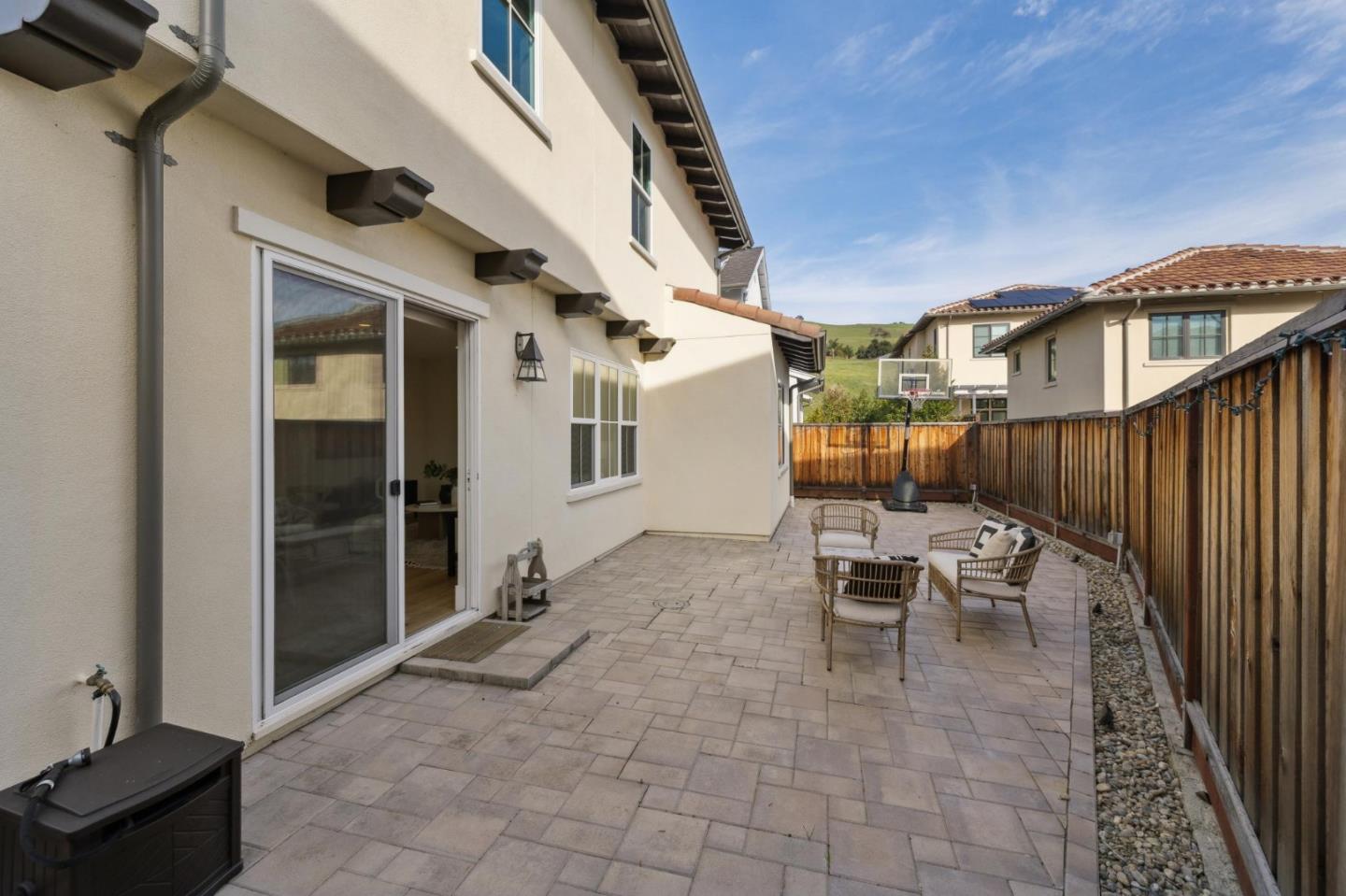 1103 Creed Street Milpitas, CA 95035 - Photo 66 of 74 a view of a patio with table and chairs and wooden floor