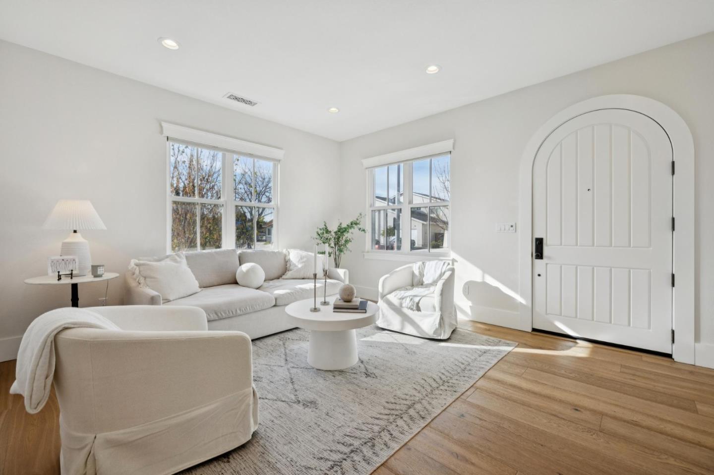 1103 Creed Street Milpitas, CA 95035 - Photo 8 of 74 a living room with furniture a table and wooden floor