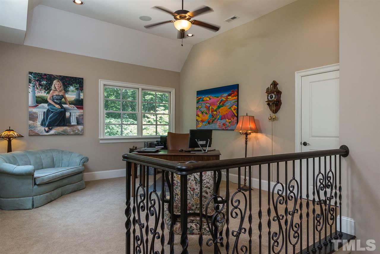 8841 Stage Ford Road Raleigh, NC 27615 - Photo 14 of 25 a view of a livingroom with furniture and window