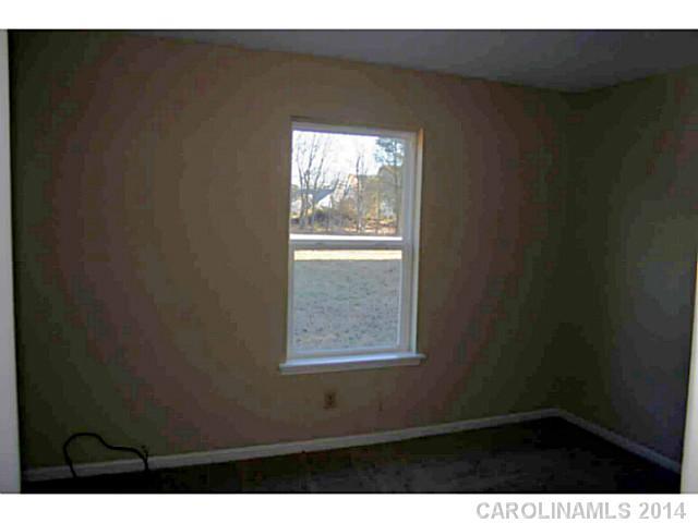 3317 Sandy Porter Road Charlotte, NC 28273 - Photo 11 of 12 a view of an empty room with a window
