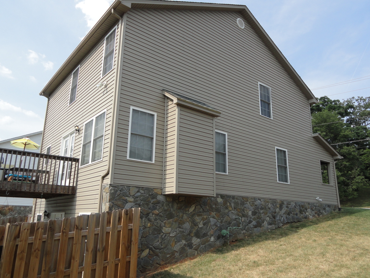 2826 Green Ridge Road Roanoke, VA 24019 - Photo 2 of 21 a view of a house with wooden fence
