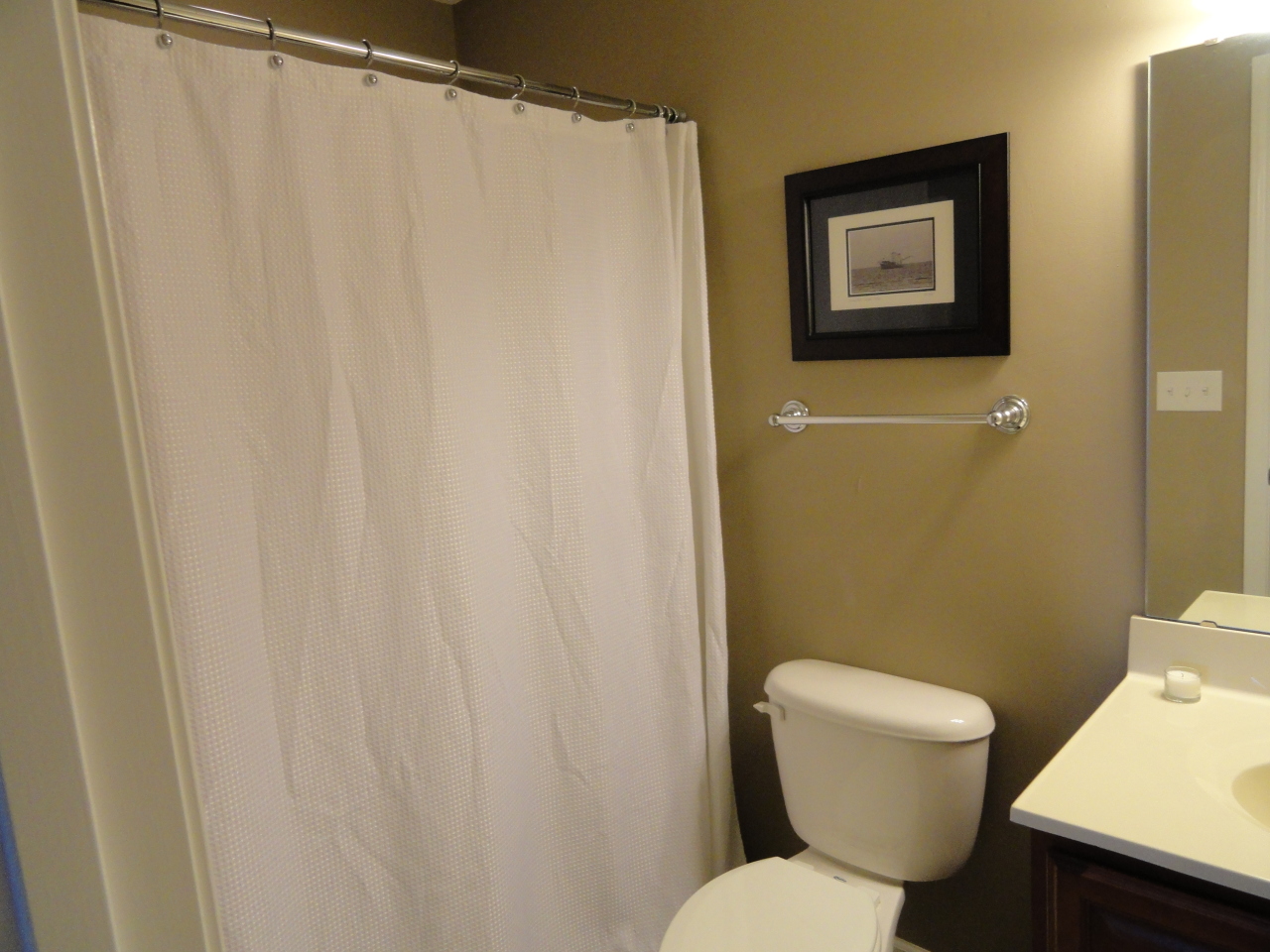 2826 Green Ridge Road Roanoke, VA 24019 - Photo 18 of 21 a white toilet sitting next to a small bathroom