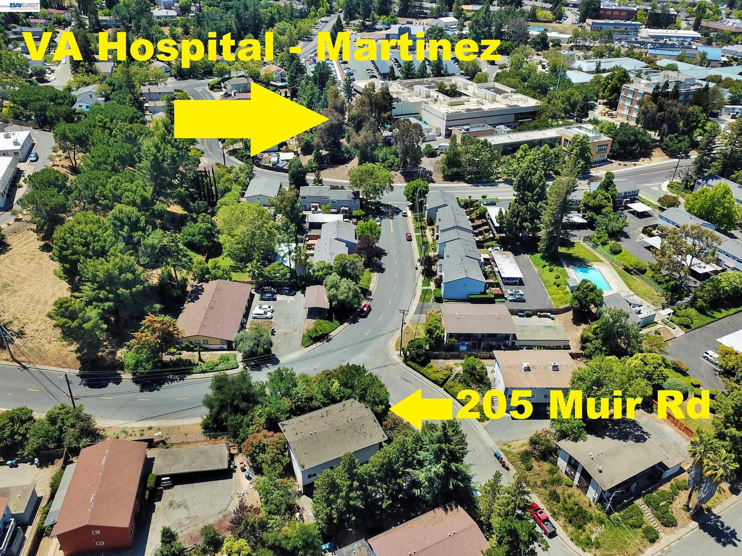 205 Muir Road Martinez, CA 94553 - Photo 2 of 20 an aerial view of residential houses with swimming pool