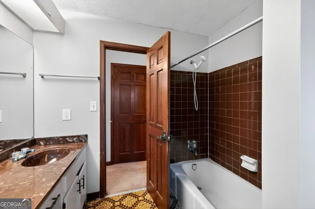 an empty room with closet area