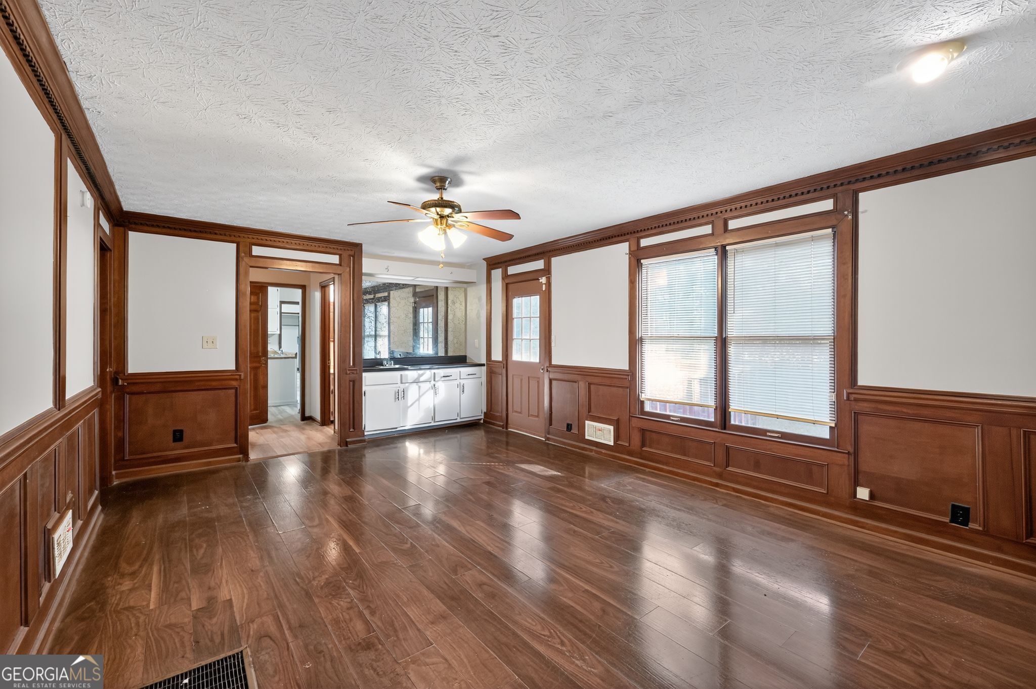 1378 Stoneleigh Hill Road Lithonia, GA 30058 - Photo 4 of 32 a view of an empty room with a window