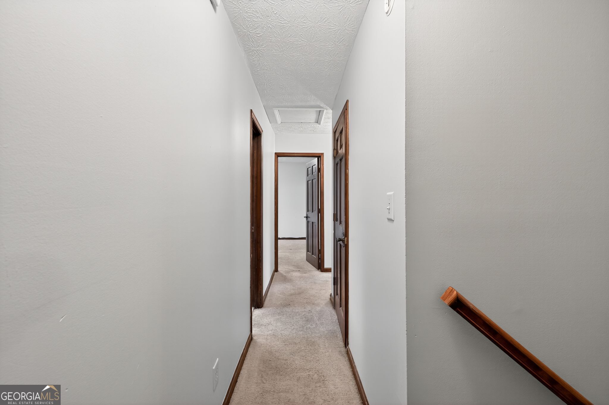 1378 Stoneleigh Hill Road Lithonia, GA 30058 - Photo 10 of 32 a view of a hallway with wooden floor