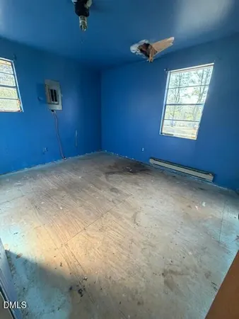 an empty room with windows