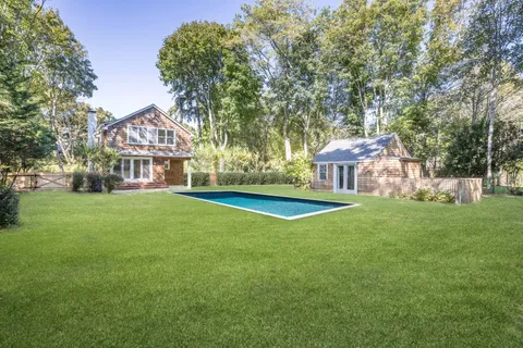 a view of a house with a big yard