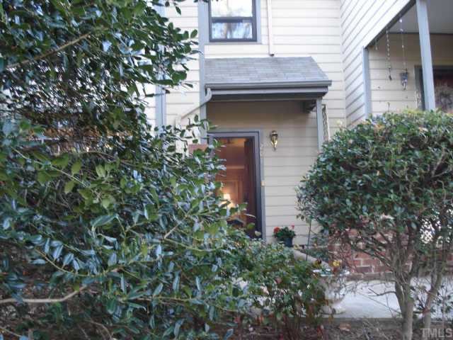 201 Broad Leaf Circle Raleigh, NC 27613 - Photo 1 of 5 a house with a tree in front of it