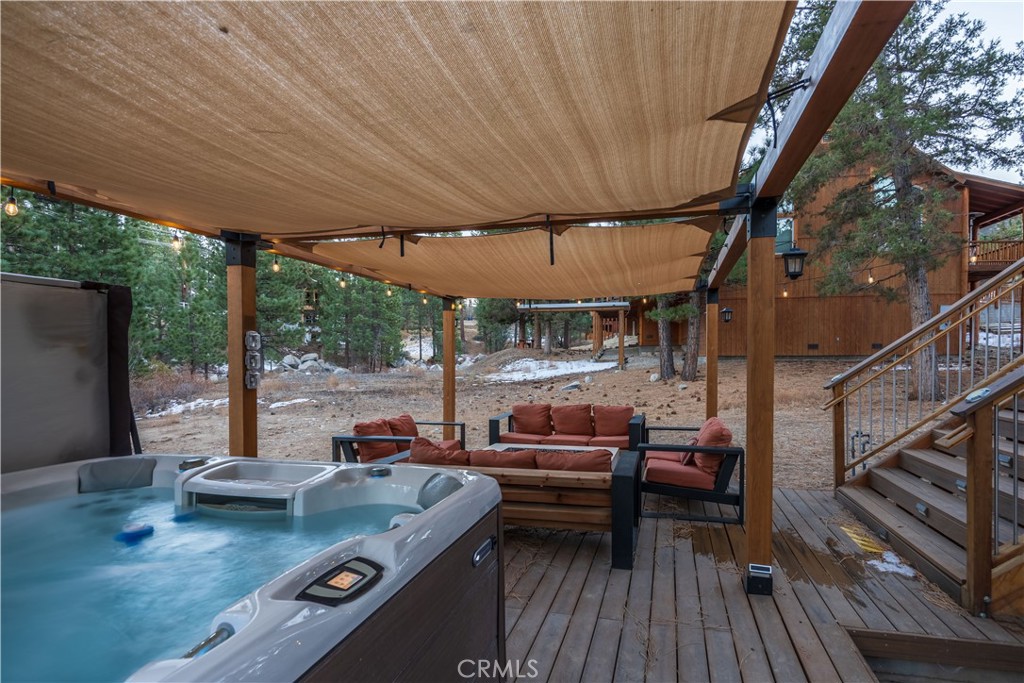 325 Stony Creek Road Big Bear Lake, CA 92315 - Photo 41 of 42 a view of a patio with table and chairs