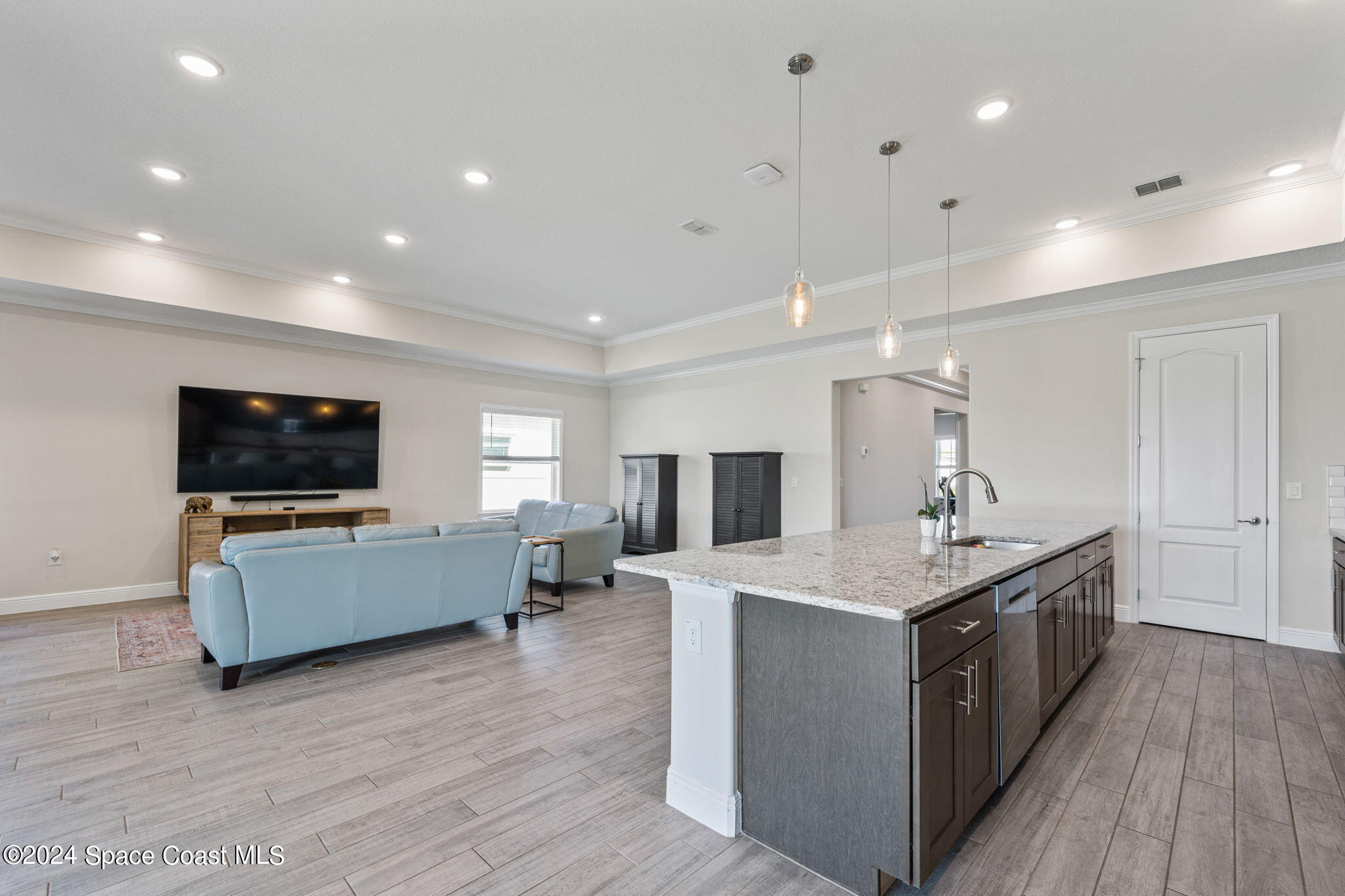 3500 Rixford Way Palm Bay, FL 32909 - Photo 12 of 55 a kitchen with a sink and a stove top oven