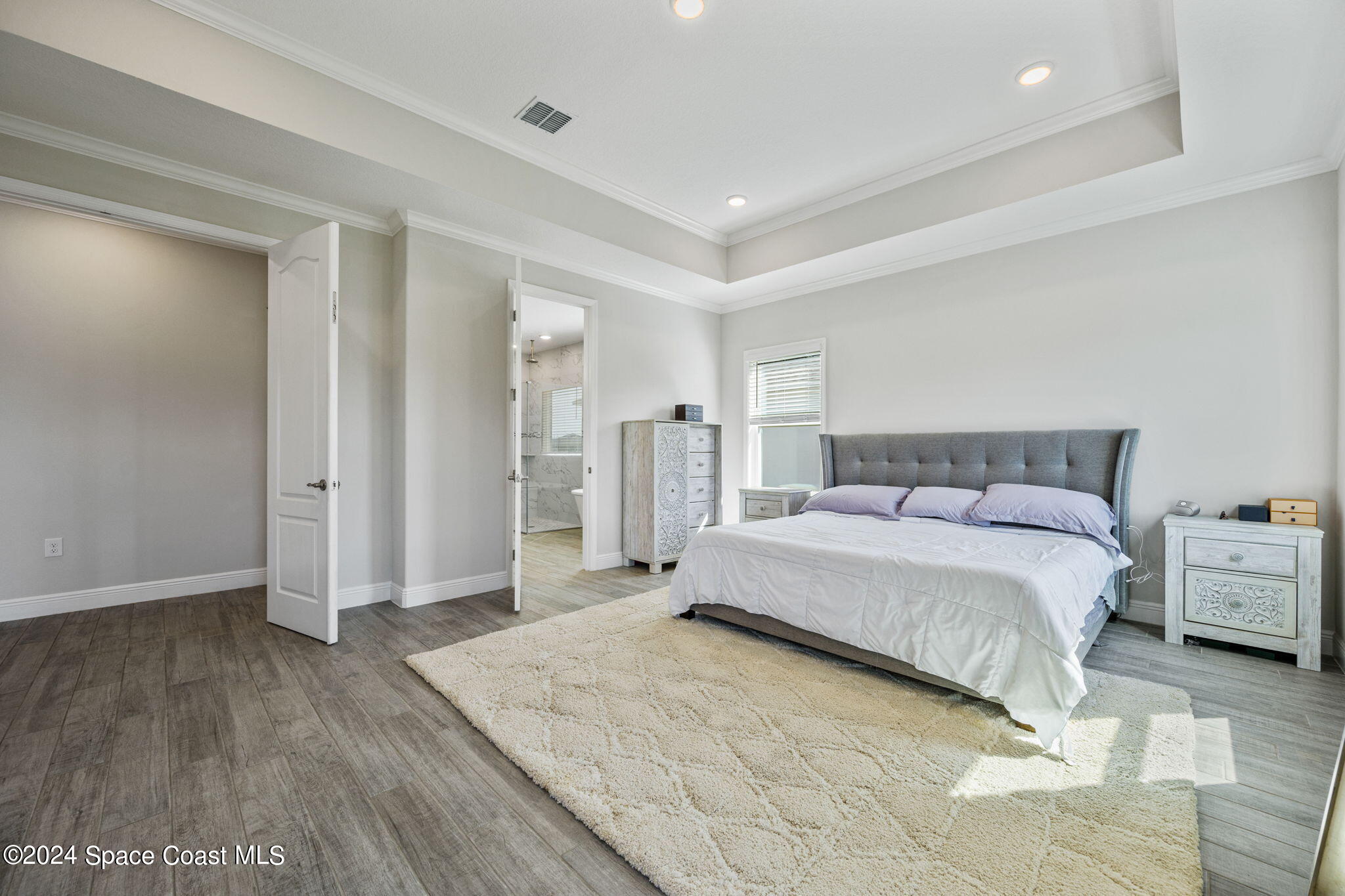 3500 Rixford Way Palm Bay, FL 32909 - Photo 18 of 55 a spacious bedroom with a bed and closet