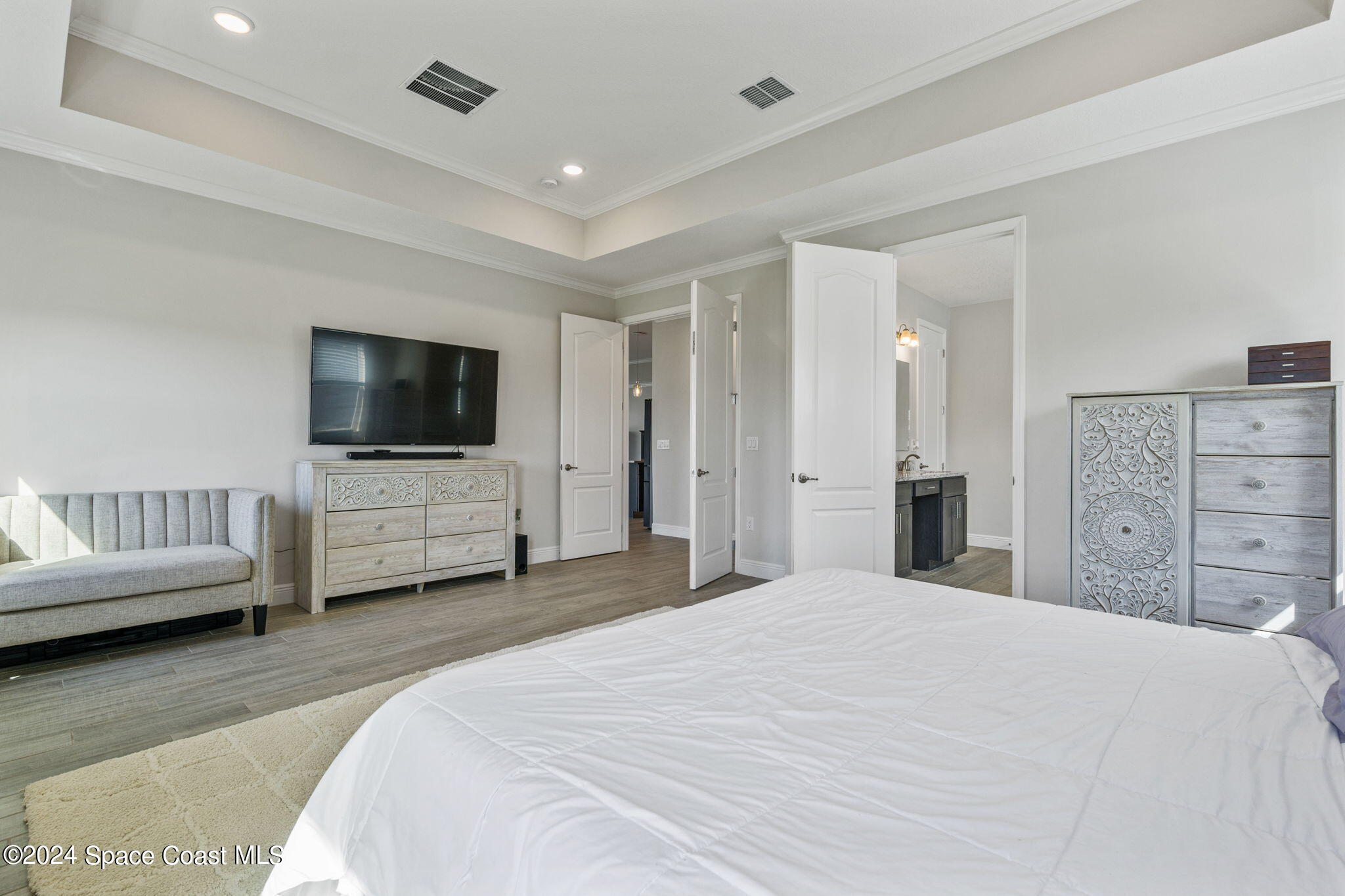 3500 Rixford Way Palm Bay, FL 32909 - Photo 22 of 55 a bedroom with a bed and a flat screen tv