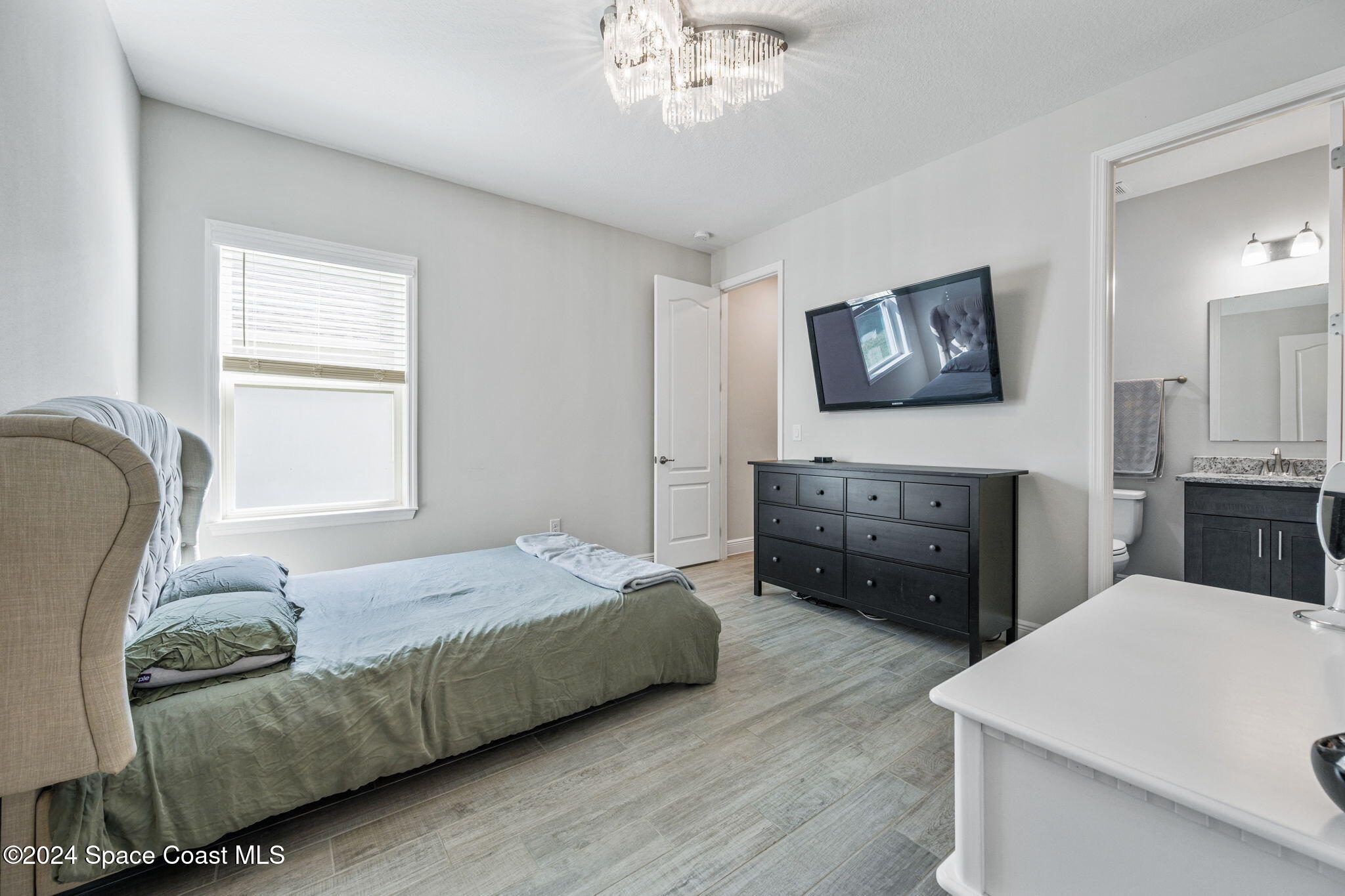 3500 Rixford Way Palm Bay, FL 32909 - Photo 27 of 55 a bedroom with a bed and a couch