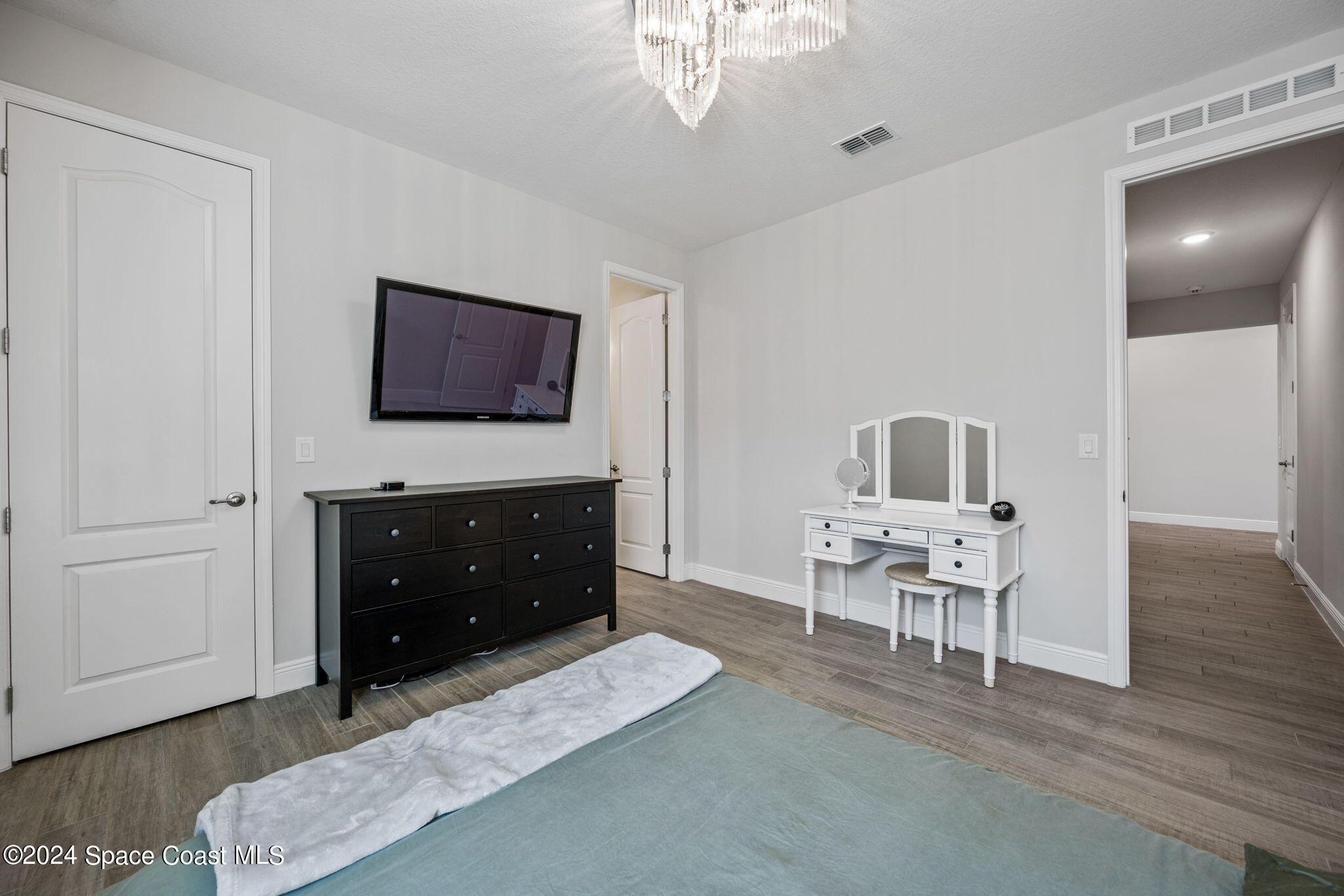 3500 Rixford Way Palm Bay, FL 32909 - Photo 28 of 55 a living room with furniture and a flat screen tv