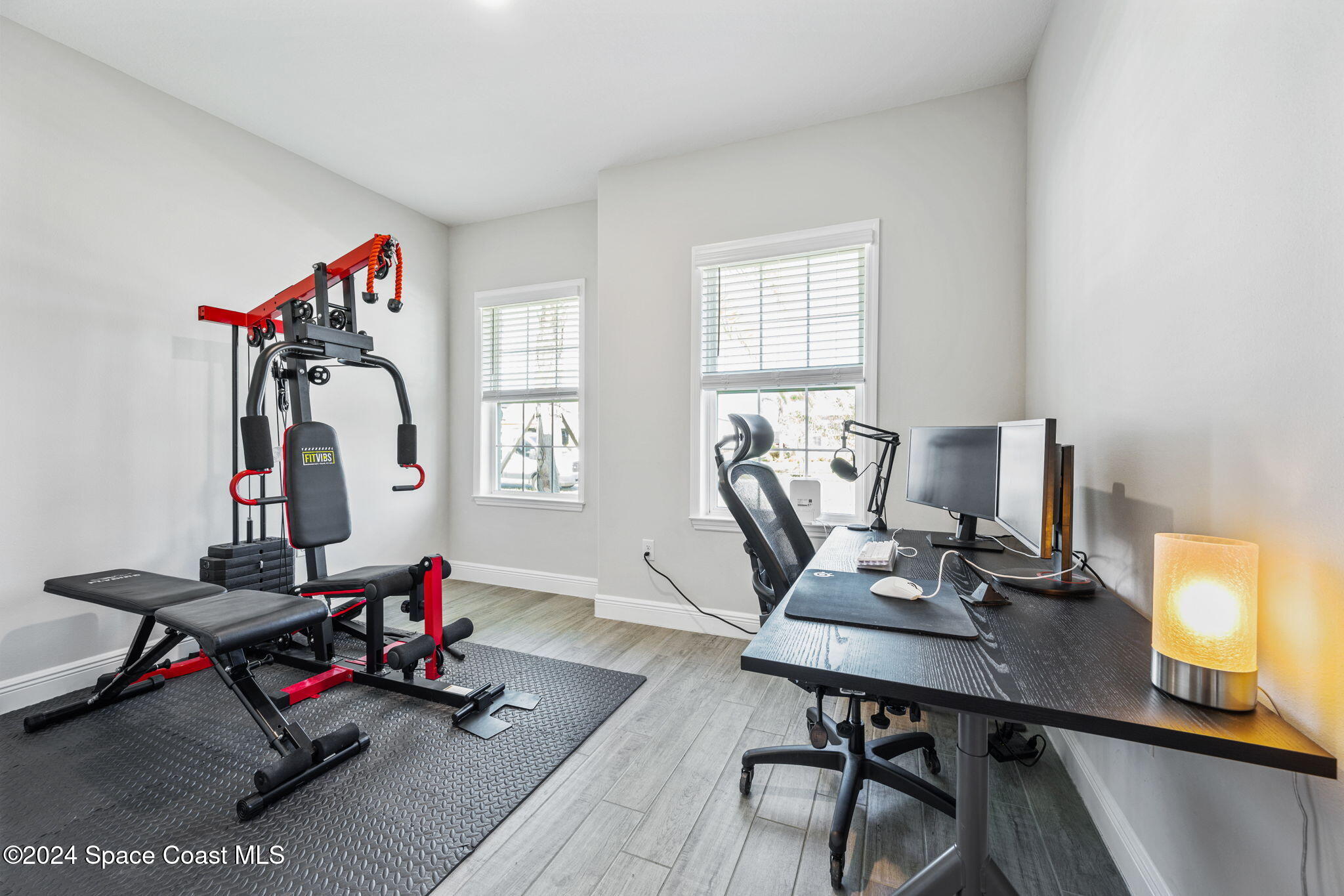 3500 Rixford Way Palm Bay, FL 32909 - Photo 29 of 55 a view of a workspace with furniture and a window