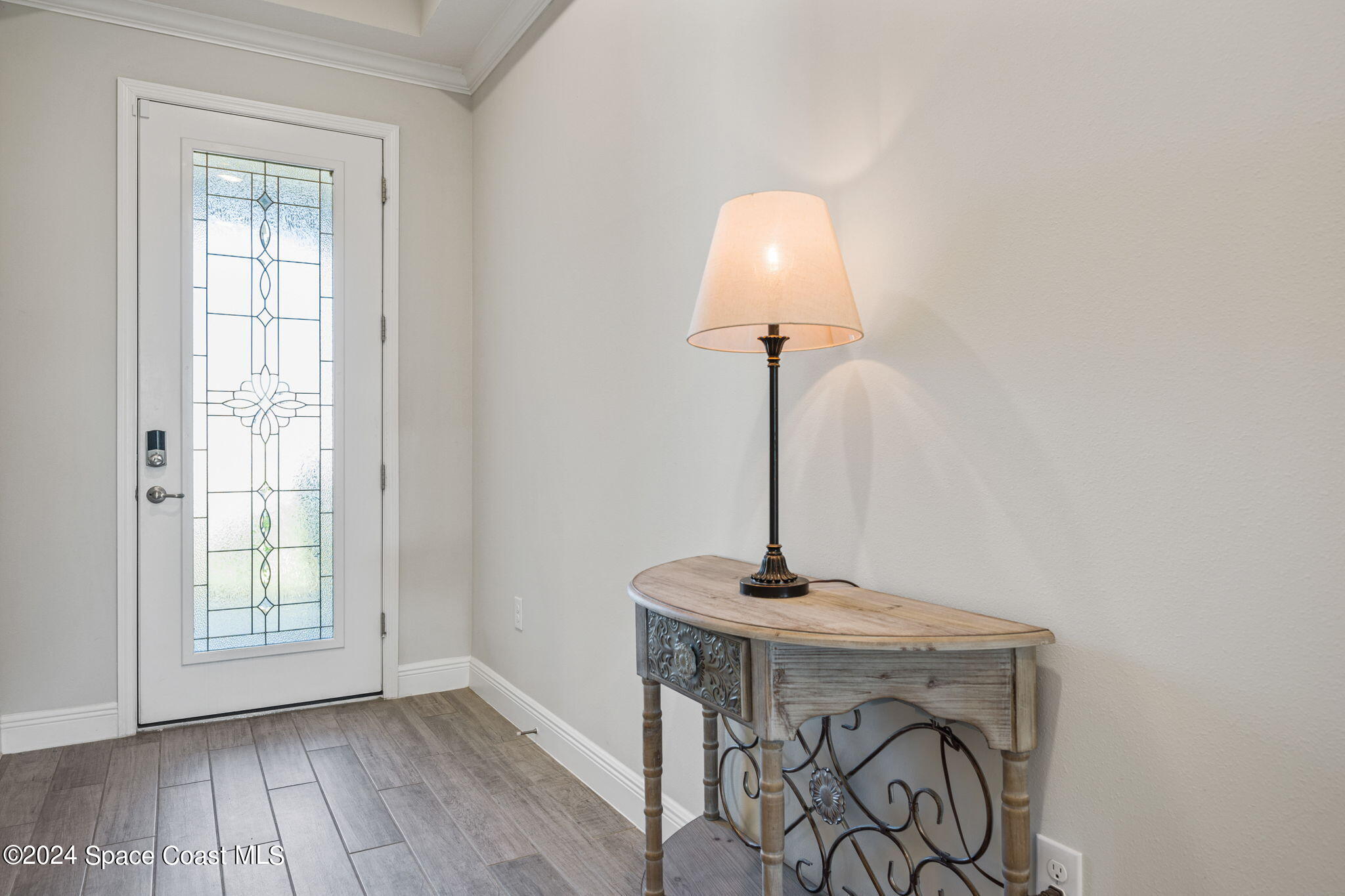 3500 Rixford Way Palm Bay, FL 32909 - Photo 4 of 55 a view of a room with a window and wooden floor