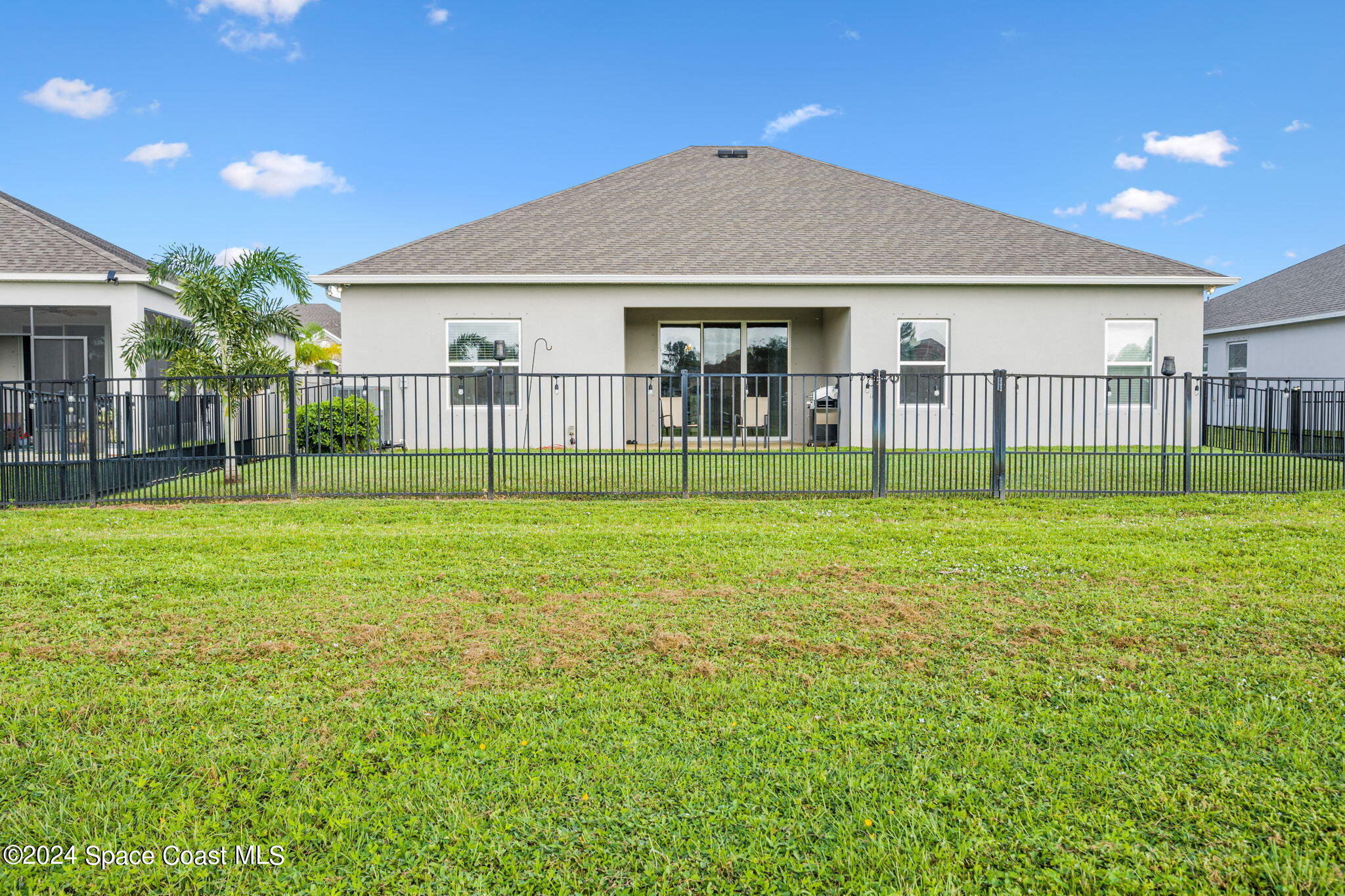 3500 Rixford Way Palm Bay, FL 32909 - Photo 42 of 55 a view of a house with a yard and a porch