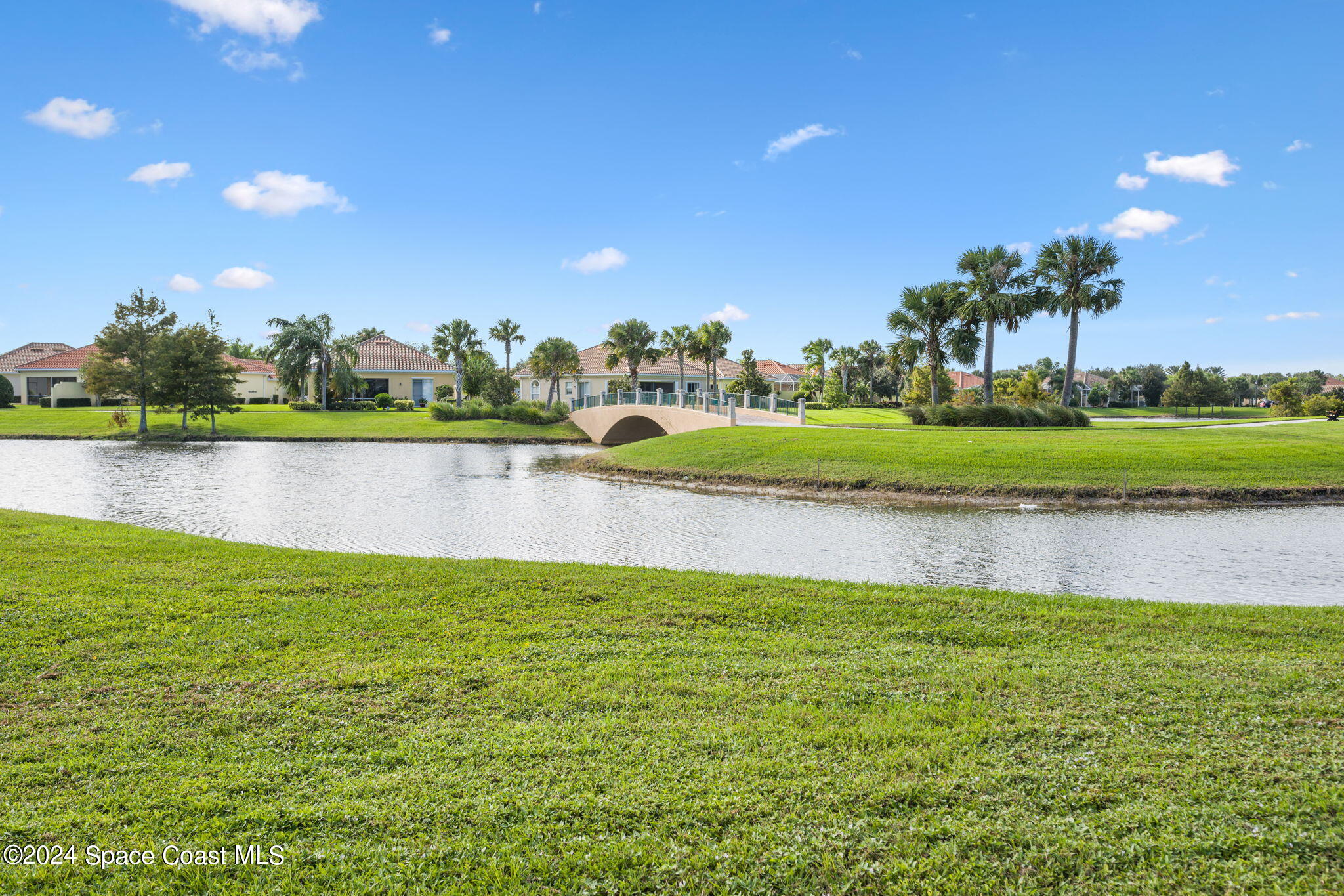 3500 Rixford Way Palm Bay, FL 32909 - Photo 46 of 55 a view of a lake with houses in the back