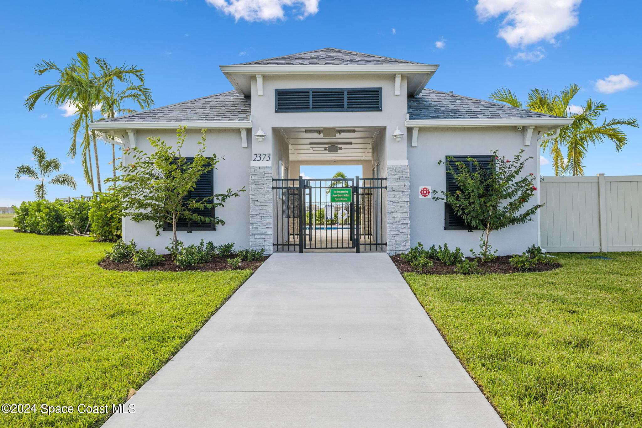 3500 Rixford Way Palm Bay, FL 32909 - Photo 47 of 55 a front view of a house with garden