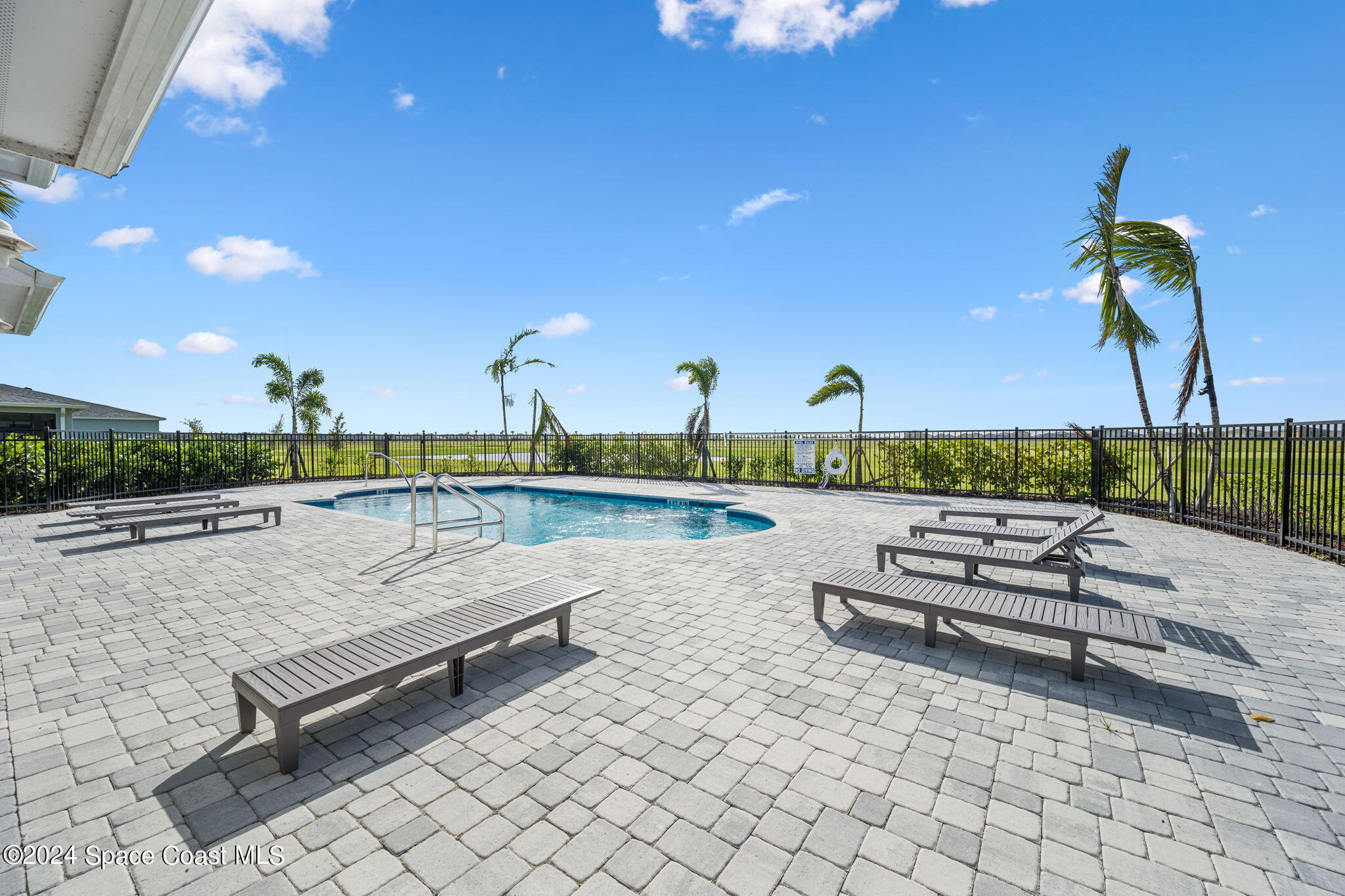 3500 Rixford Way Palm Bay, FL 32909 - Photo 51 of 55 a view of swimming pool with outdoor seating and a potted plant