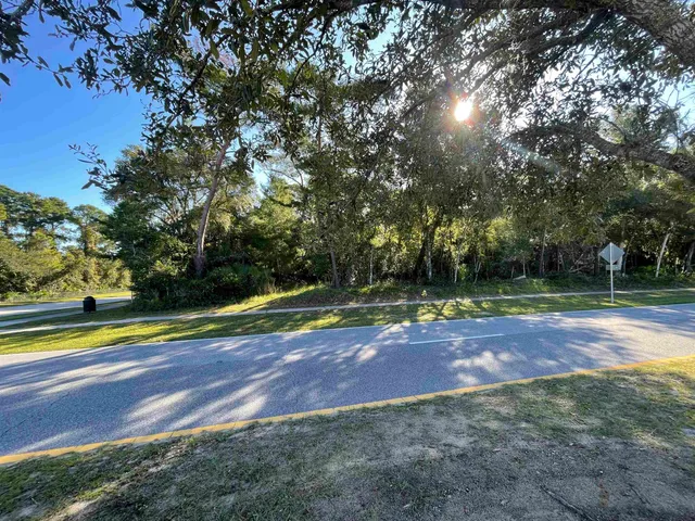 a park view with a slide and swing