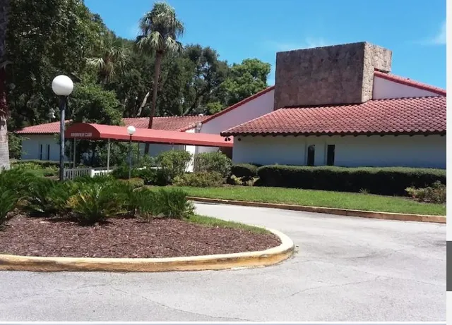 a view of lake with mountain in the background