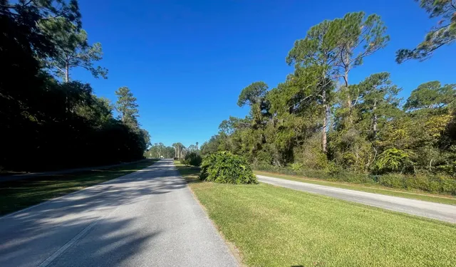 a view of lake with green space