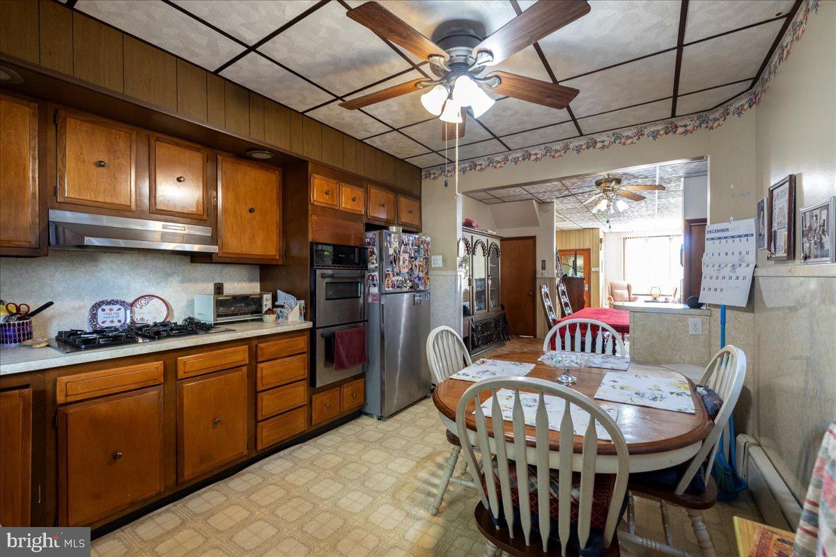 1229 Jackson Street Philadelphia, PA 19148 - Photo 11 of 29 a view of a dining room with furniture window and wooden floor