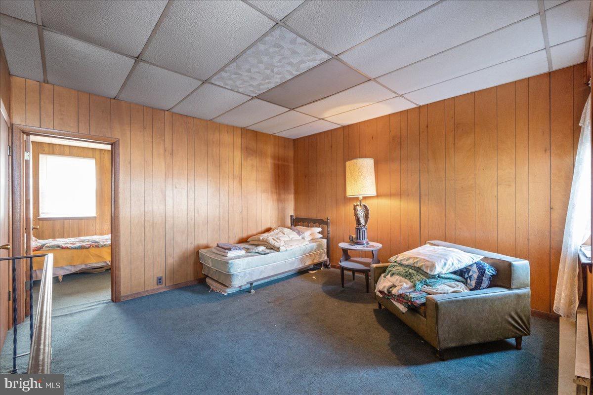 1229 Jackson Street Philadelphia, PA 19148 - Photo 19 of 29 a bedroom with bed and window
