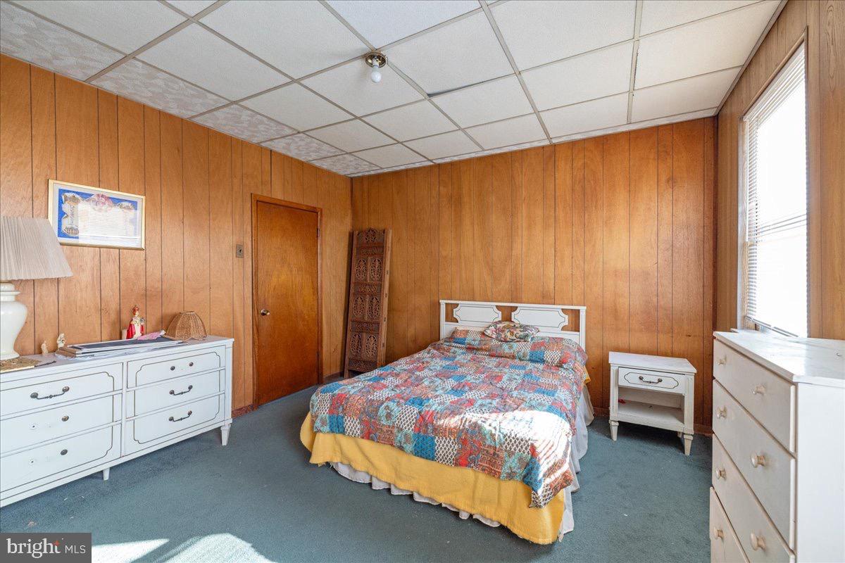 1229 Jackson Street Philadelphia, PA 19148 - Photo 22 of 29 a bedroom with a bed and a window