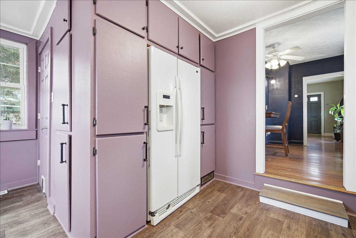 511 East Chestnut Street Bloomington, IL 61701 - Photo 16 of 32 a view of a hallway with wooden floor and staircase