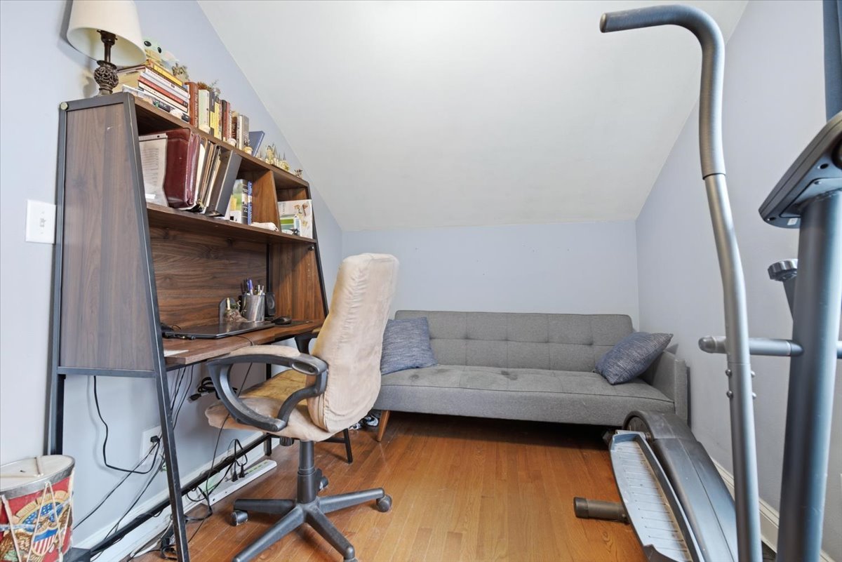 511 East Chestnut Street Bloomington, IL 61701 - Photo 19 of 32 a living room with furniture and a fireplace