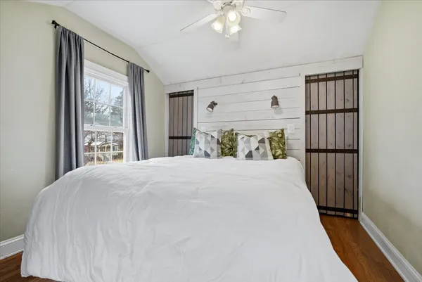 a view of a bedroom from a hallway