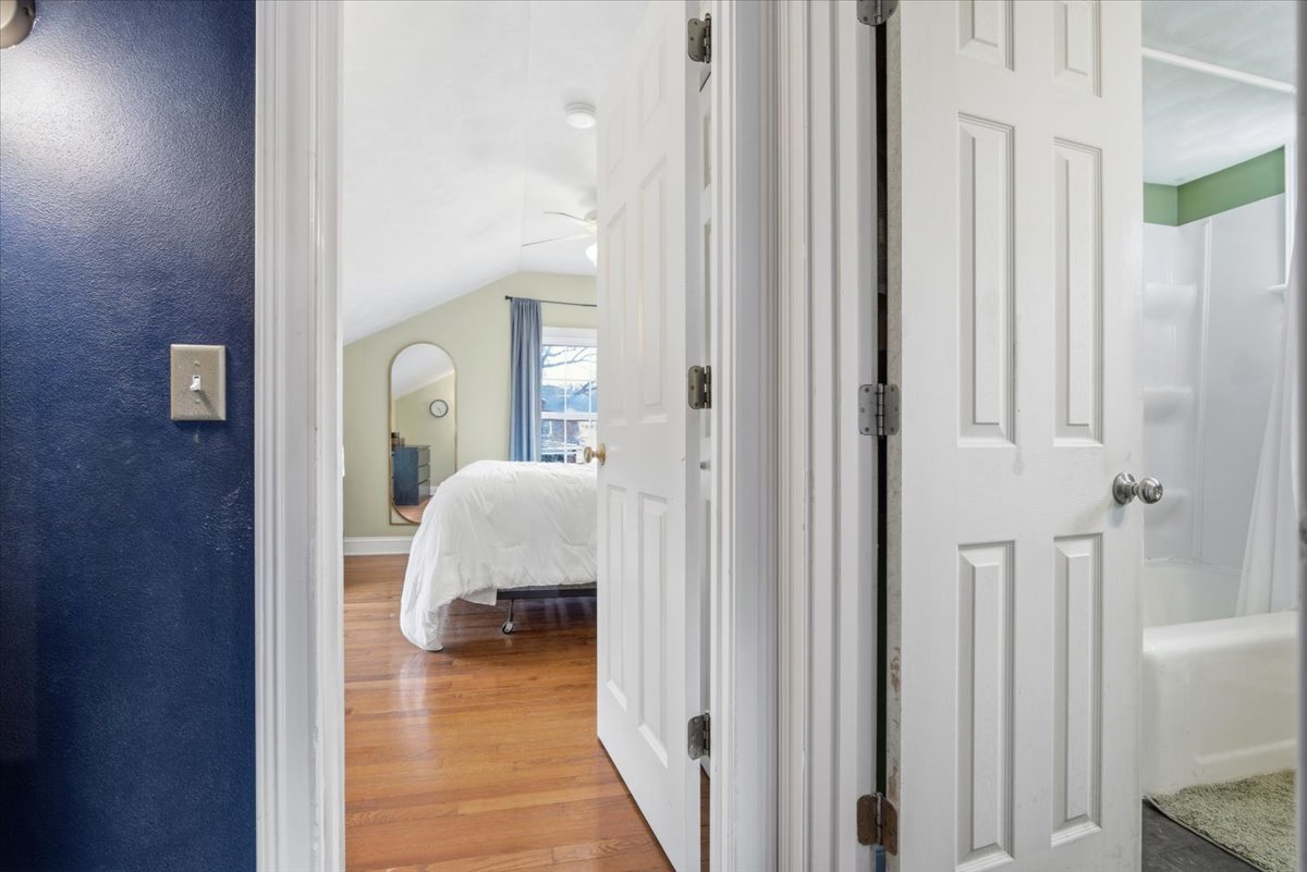 511 East Chestnut Street Bloomington, IL 61701 - Photo 25 of 32 a view of a bedroom from a hallway