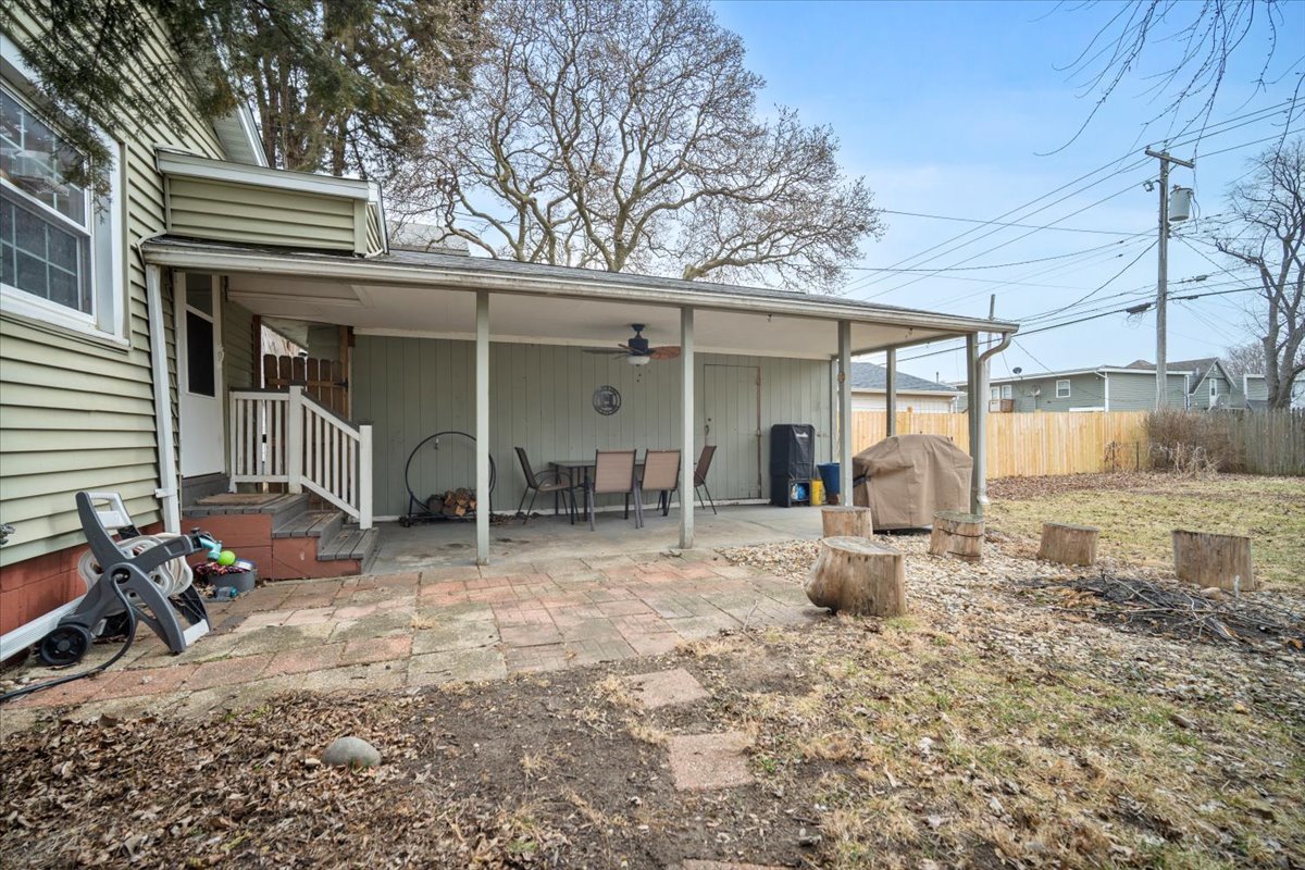 511 East Chestnut Street Bloomington, IL 61701 - Photo 29 of 32 a view of a chair and table in backyard of house