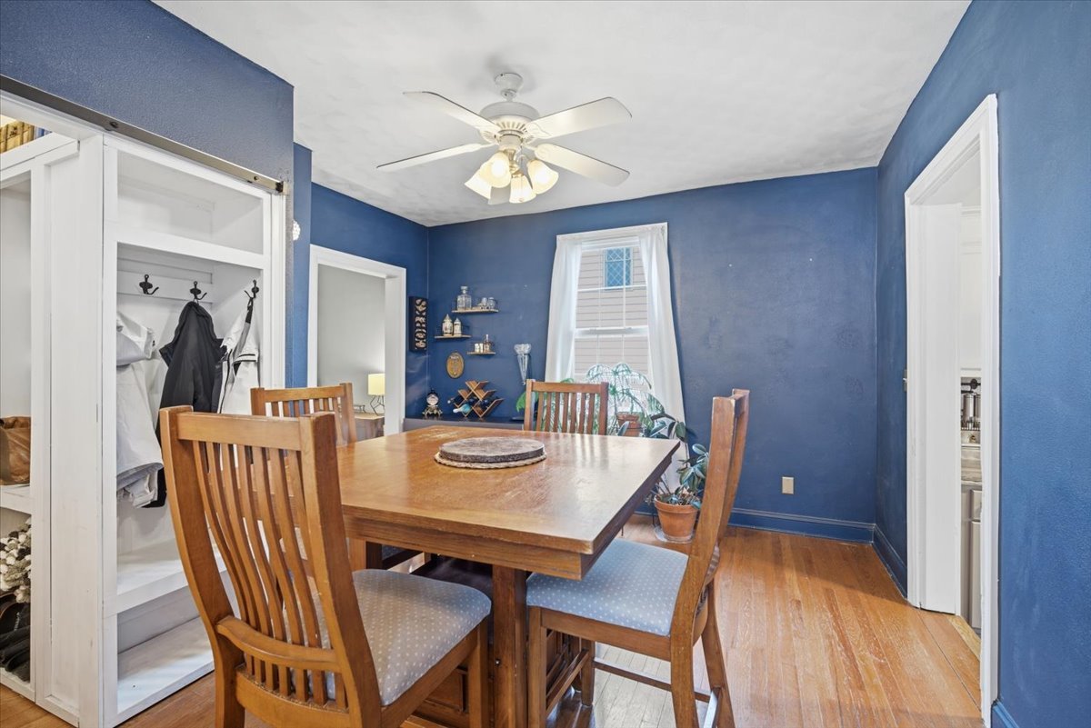 511 East Chestnut Street Bloomington, IL 61701 - Photo 9 of 32 a view of a dining room with furniture window and wooden floor