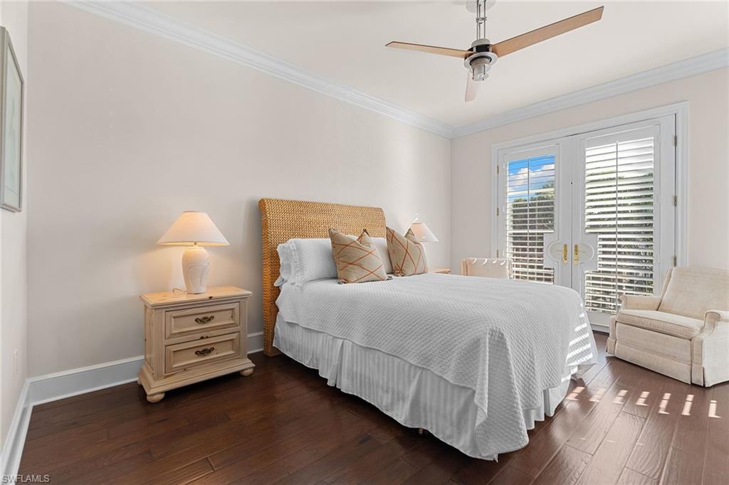 780 5th Avenue South, Unit 306 Naples, FL 34102 - Photo 23 of 31 a bedroom with bed and window