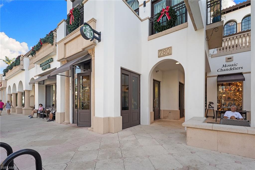 780 5th Avenue South, Unit 306 Naples, FL 34102 - Photo 27 of 31 a view of a building with brick walls
