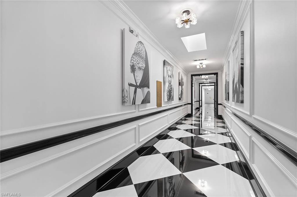 780 5th Avenue South, Unit 306 Naples, FL 34102 - Photo 4 of 31 a dining room with wooden floor and breakfast area