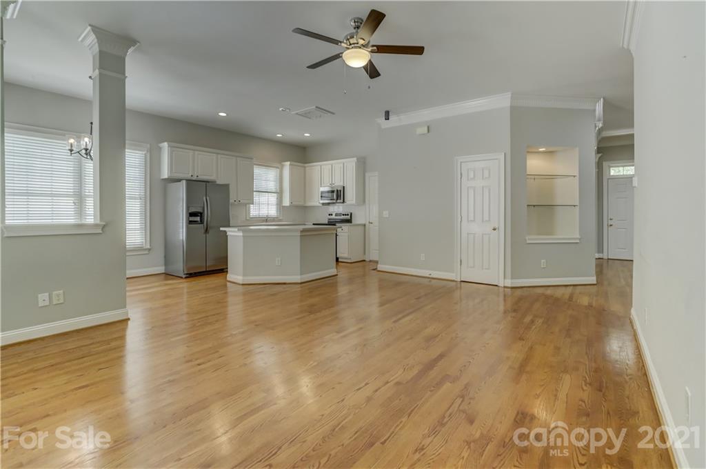 548 Glen Walk Drive Fort Mill, SC 29708 - Photo 16 of 48 a view of a kitchen with a sink and dishwasher a refrigerator with wooden floor